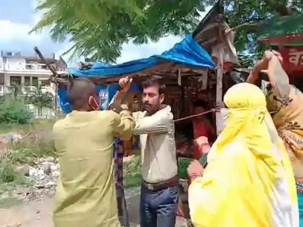 bjp leader thrashed for chasing girl