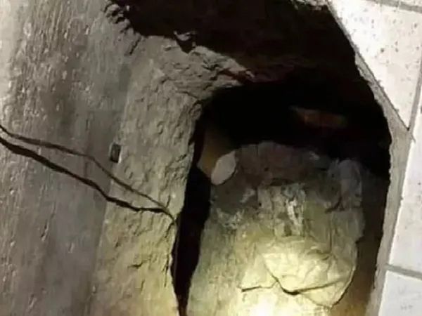 Man builds secret tunnel to his Married lover's house gets caught by her husband