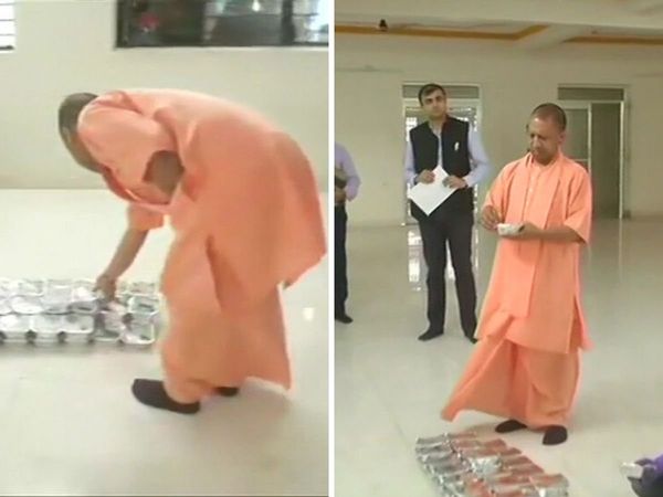 Chief Minister Yogi Adityanath inspects a community kitchen in Lucknow's Jiamau