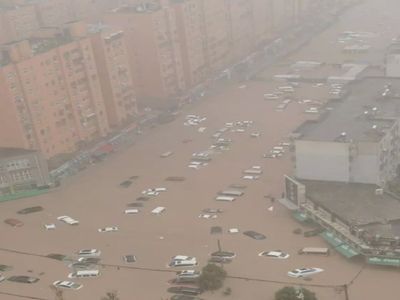 Flood : Heaviest rain in 1000 years in China's Henan province, floating cars, 33 dead, many missing Flood : Heaviest rain in 1000 years in China's Henan province, floating cars, 33 dead, many missing