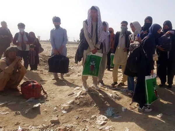 United Nations warns of Afghan food crisis as Taliban parades seized weapons