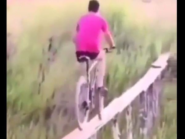 Man Fall Down in river during cycle stunt