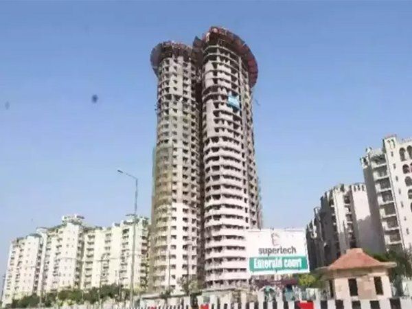 demolition of Supertech twin towers
