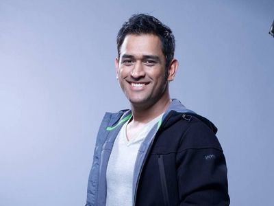 MS Dhoni with child of a CSK team mate MS Dhoni with child of a CSK team mate
