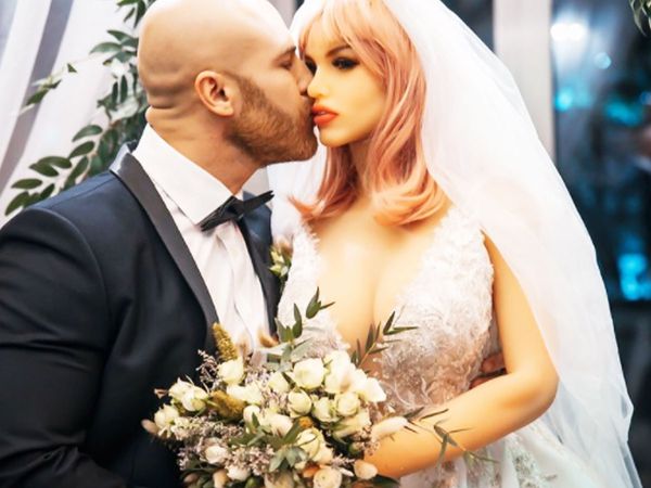 A bodybuilder from kazakhstan  who ties knot with his own sex doll says she is broken and is being repaired