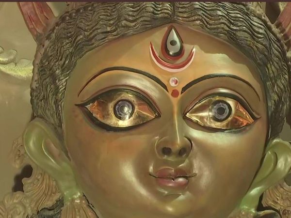 viral Photo Durga idols dressed in gold saree installed with gold eyes in Kolkata 