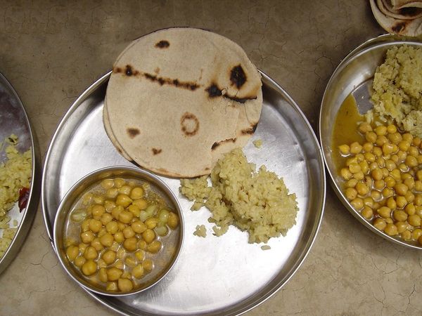 eating rice roti together