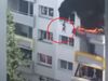 Two Brothers jump from window of a blazing building crowd catches him see the VIDEO