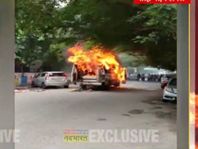 Delhi : School bus catches fire in Rohini Delhi : School bus catches fire in Rohini