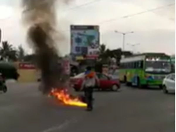 Drunk man sets his bike on Fire in Bangalore Video