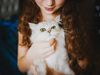 girl with pet cat
