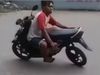 Jugaad Viral Video Boy Riding Scooty in unique style Funny video Goes viral in hindi