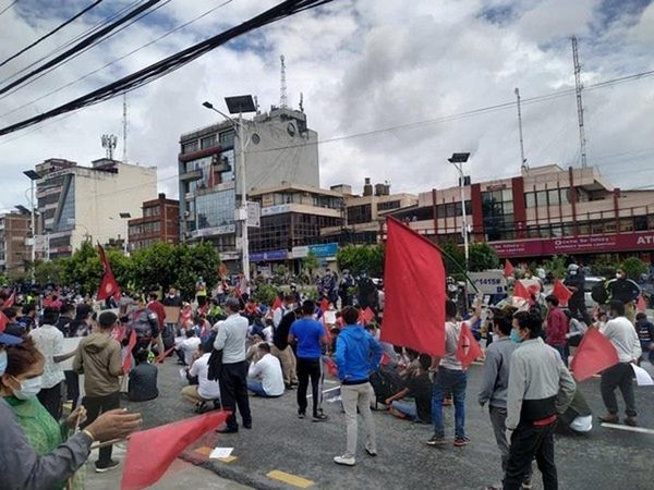 Students protest against Oli government over corruption, its handling of COVID-19 pandemic