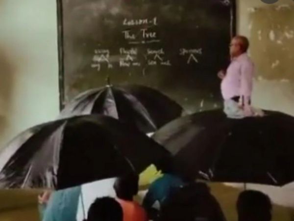 Students Study With umbrella in Seoni Madhya Pradesh Video Goes Viral