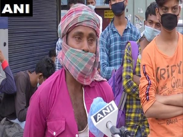 'न ही कुछ खाने को मिल रहा, न टिकट मिल रहा', दिल्‍ली रेलवे स्‍टेशन पर उमड़े प्रवासियों की मुश्किल