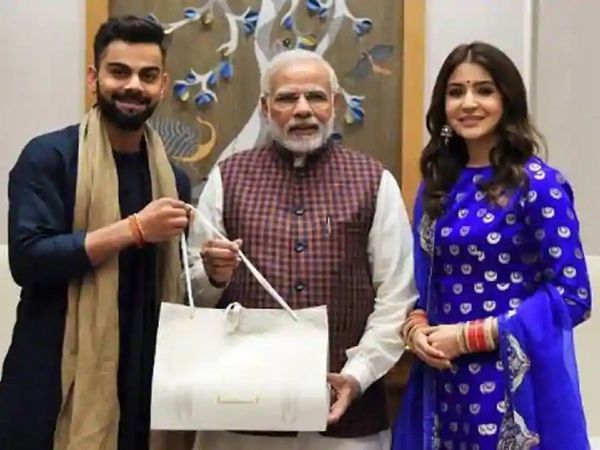 pm narendra modi with virat kohli and anushka sharma