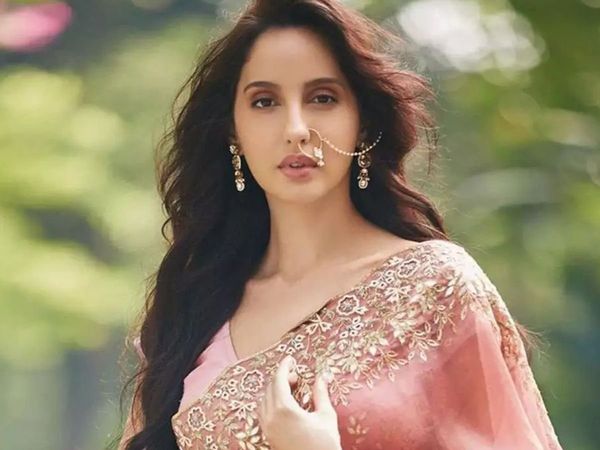 Nora Fatehi GLAMOROUS pink saree look is viral fans says stunning