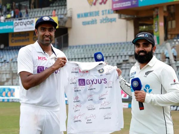 ravichandran ashwin gifted autographed jersey to Ajaz Patel