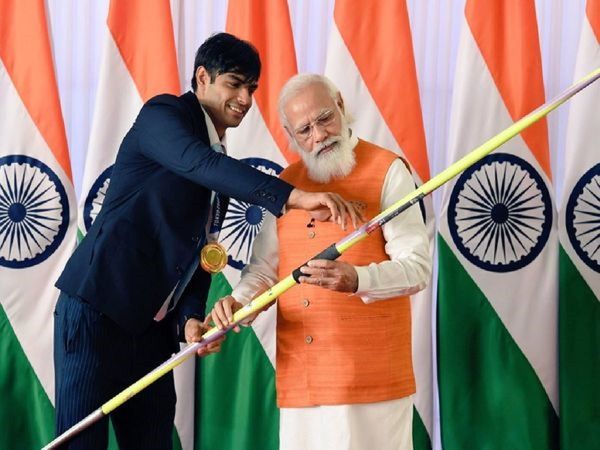 PM Narendra Modi and Neeraj Chopra