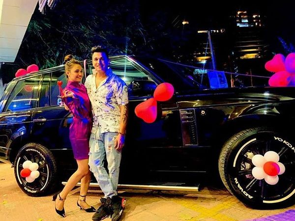 Prince Narula and Yuvika Chaudhary pose with Range Rover