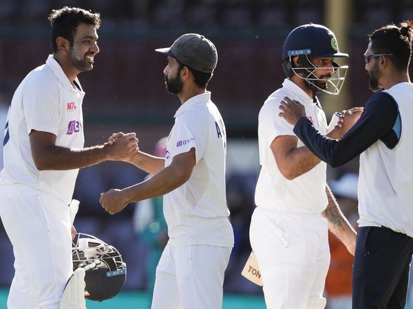 ajinkya rahane shakes hand with ravichandran ashwin