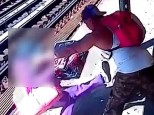 Man Pushed Woman On Railway Track Then What Happened Watch Shocking Video
