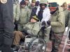 rajnath singh escorts Brigadier(Retd) R V Jatar on wheelchair in Leh