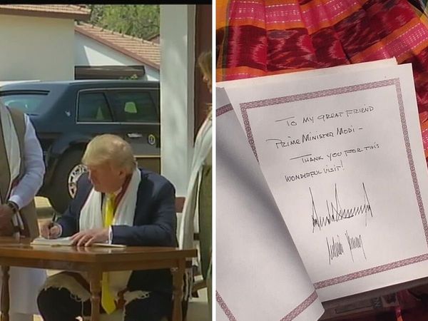 Donald Trump writes a message in the visitors' book at the Sabarmati Ashram