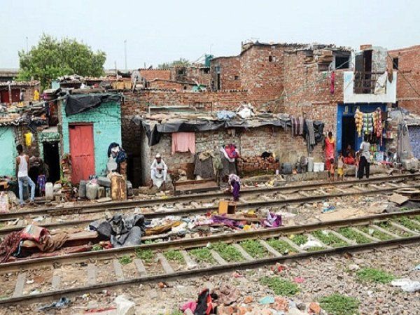slums side on railway tracks