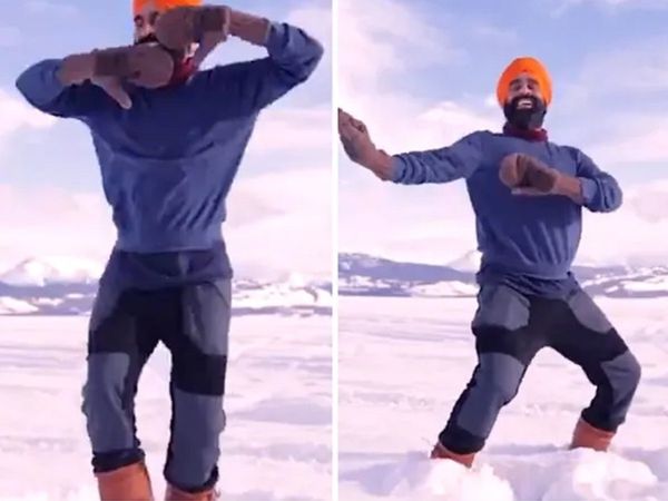 कोविड-19 वैक्‍सीन लगवाने के बाद बर्फ से जमी झील पर भांगड़ा करने लगा शख्‍स, वायरल हुआ Video