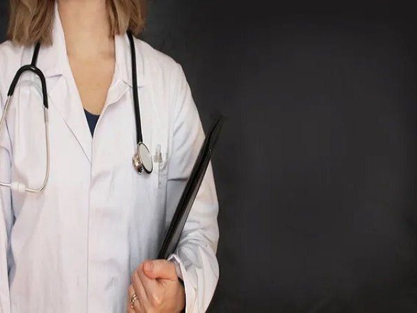 woman doctor threatened