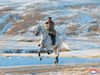 Kim Jong Un rides white horse to climb Mount Paektu in North Korea