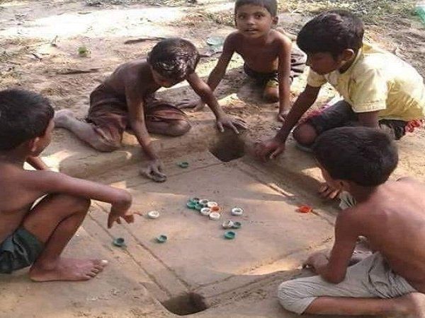 children playing carrom