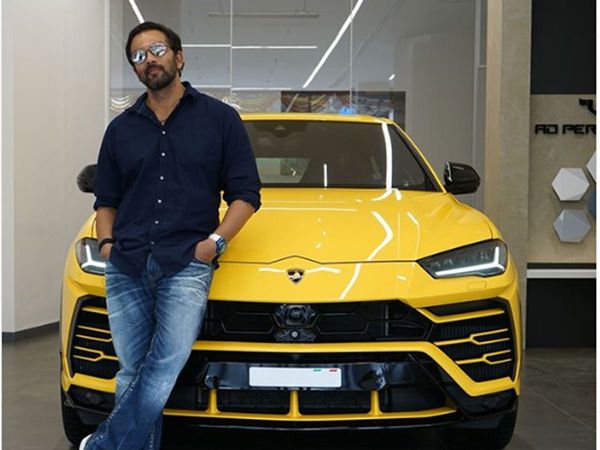khatron ke khiladi And Sooryavanshi Director Rohit Shetty buy New Car Poses With yellow Lamborghini Urus